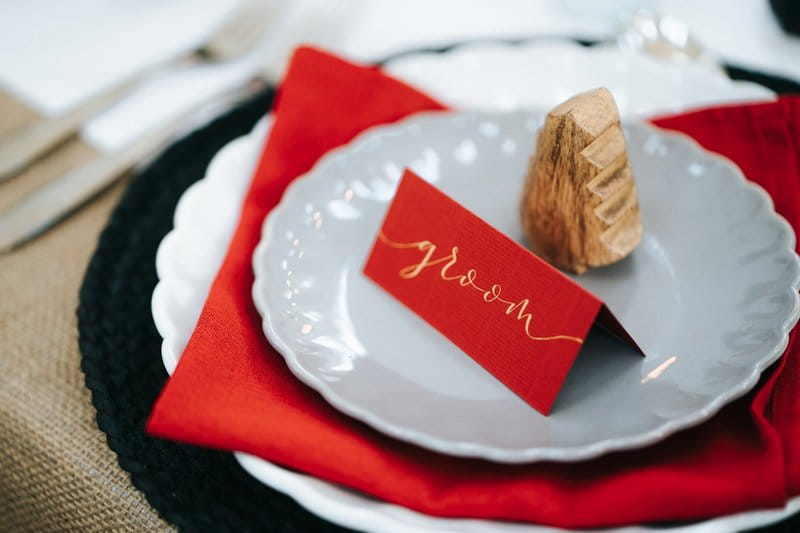 Red groom name place card