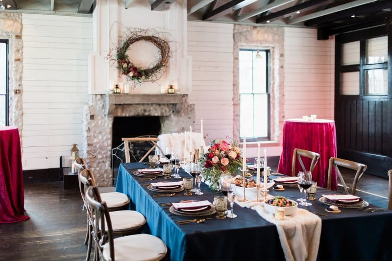 Winter wedding table with navy blue tablecloth