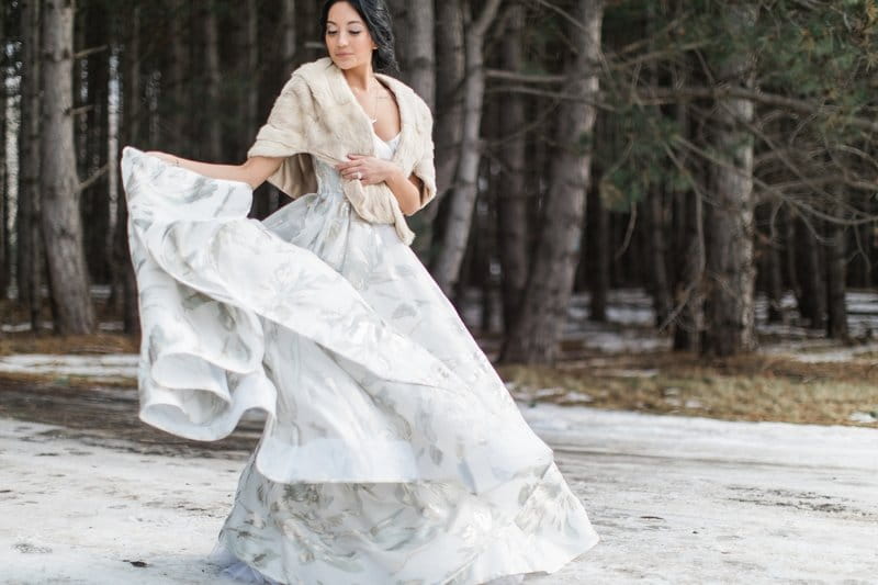 Bride twirling in snow