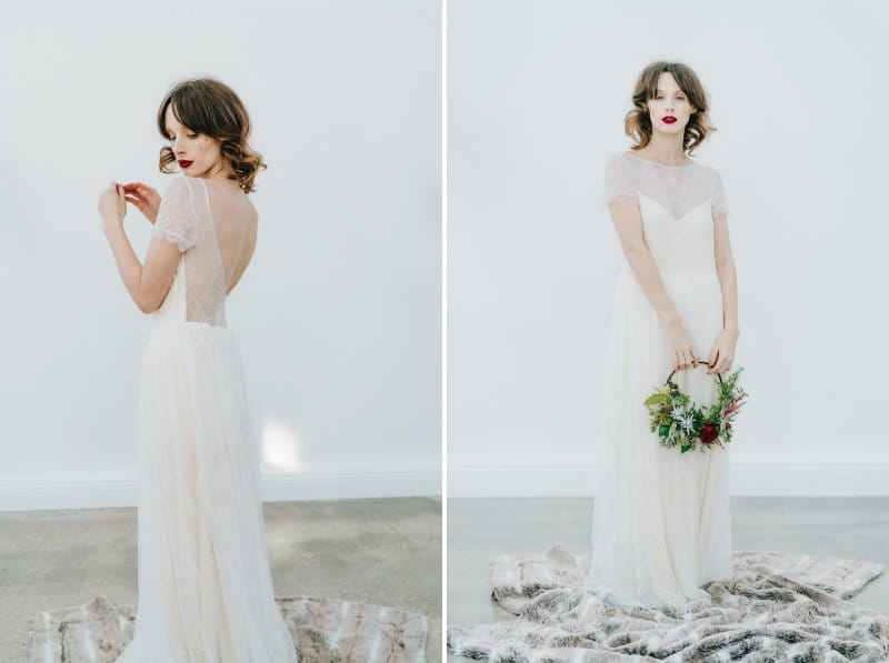 Bride holding winter floral hoop