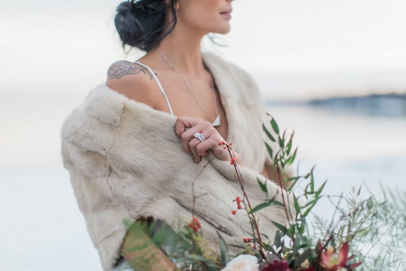 Bride wearing winter fur shrug