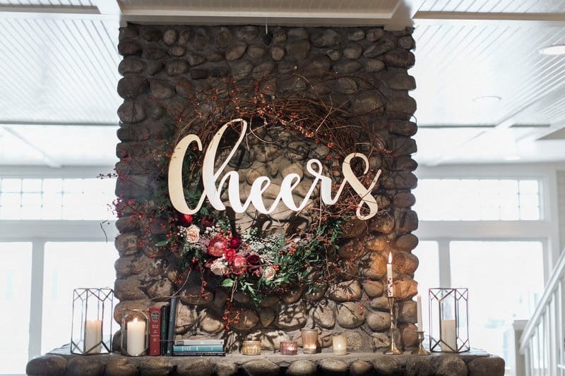 Cheers sign and wreath on wall