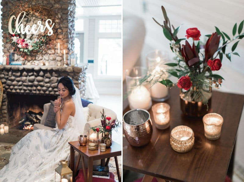 Bride sitting next to small table of candles