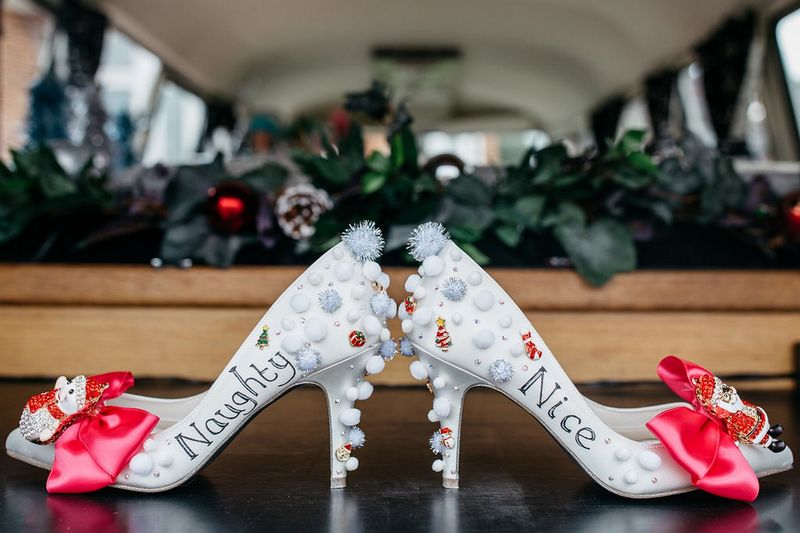 Naughty or nice wedding shoes covered in pom poms