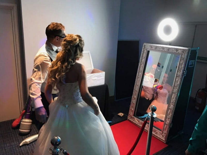 Bride and Groom Looking in Magic Mirror