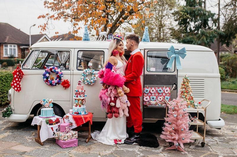 Bride and groom outside VW van with 'Merry Kitschmas' wedding styling