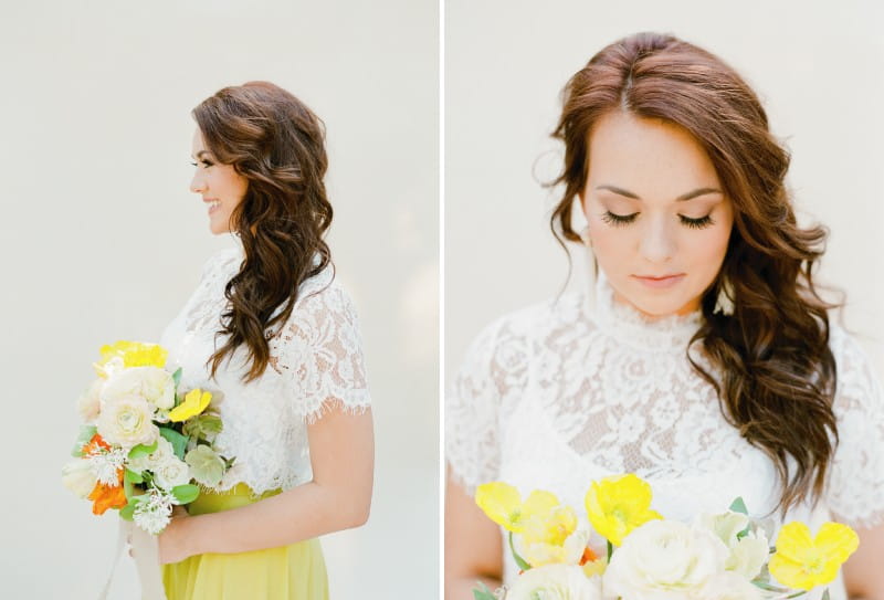 Bridesmaid with loose curl hairstyle holding bouquet with yellow flowers