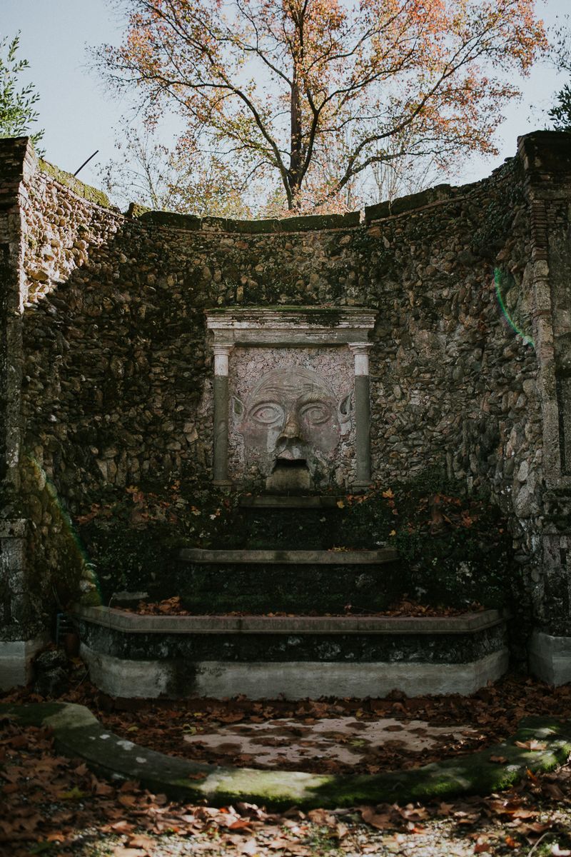 Stone carving of face in monument