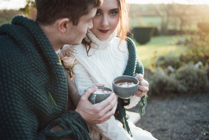 Bride and groom drinking hot chocolate