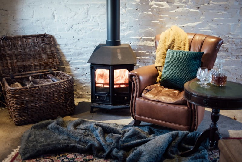 Cosy fireside seating in Coombe Trenchard