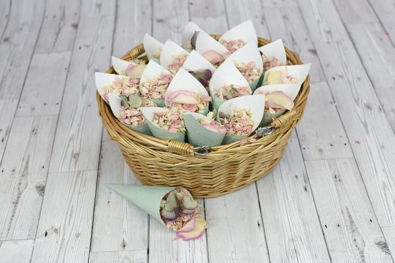 Basket of biodegradable confetti in paper cones