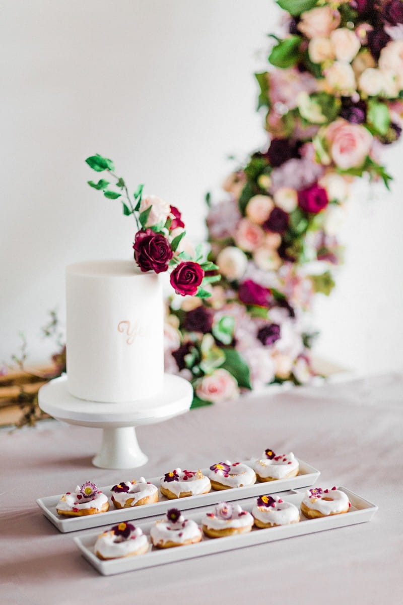 Simple white engagement cake