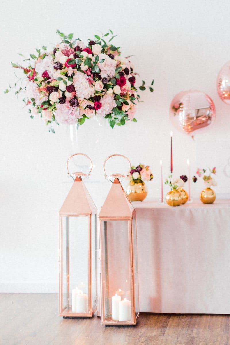 Tall rose gold lanterns