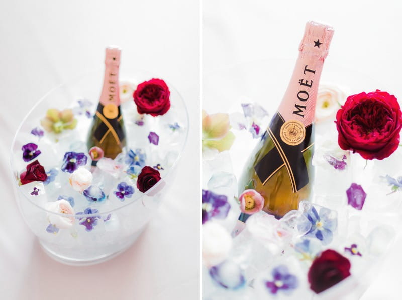 Ice bucket with flowers and bottle of Moët