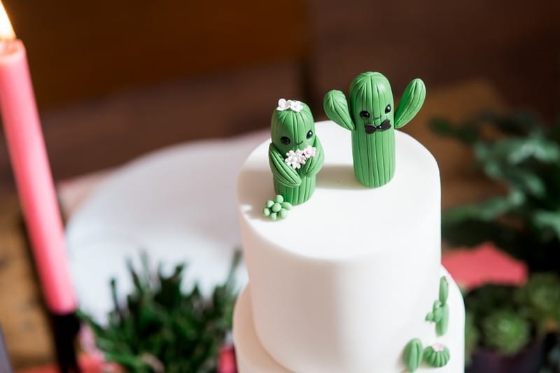 Bride and groom cactus wedding cake topper