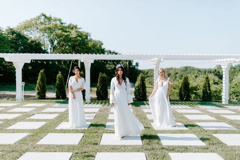 Three brides in grounds of Greenhouse Two Rivers