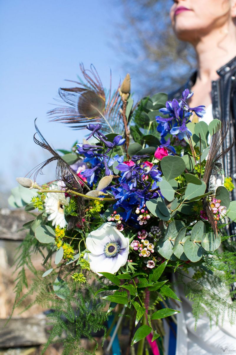 Rustic bridal bouquet with purple flowers