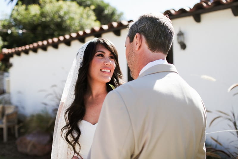 Bride and groom facing each other