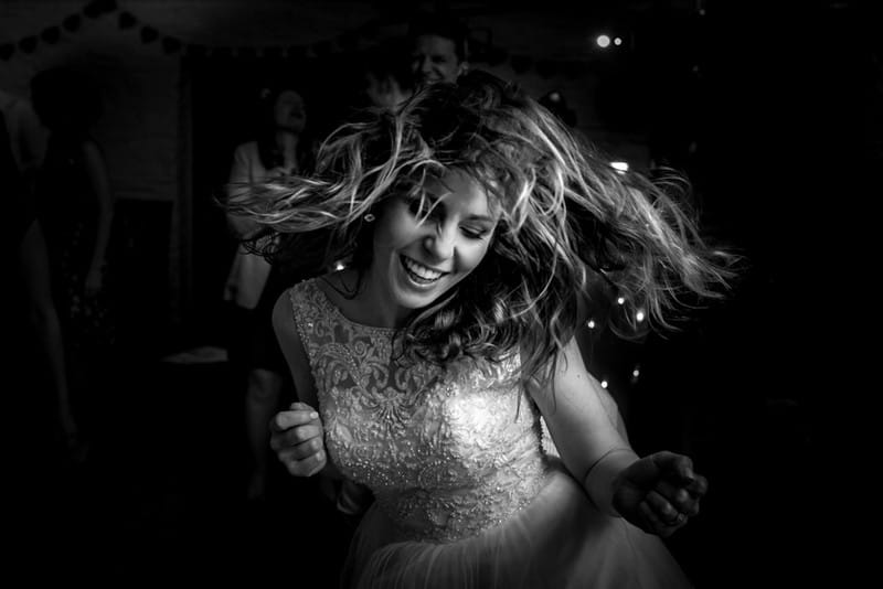 Close-up of bride dancing at wedding - Picture by Matt Badenoch Photography