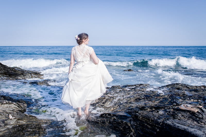 Bride paddling in the sea - Picture by Brian Robinson Photography