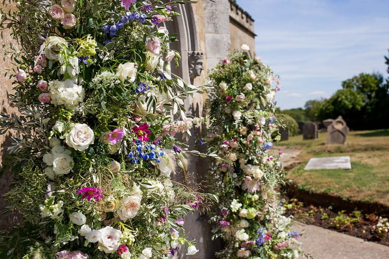 Display of country flowers outside church