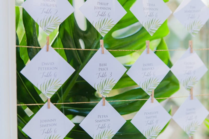 Escort cards with tropical leaf design