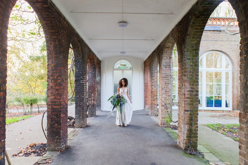 Bride in walkway at Holland Park