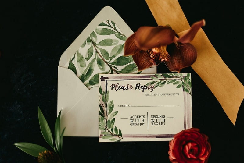 Wedding RSVP and envelope with leaf detail