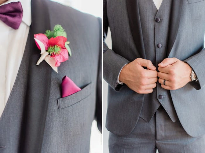 Groom's grey suit and bright pink buttonhole
