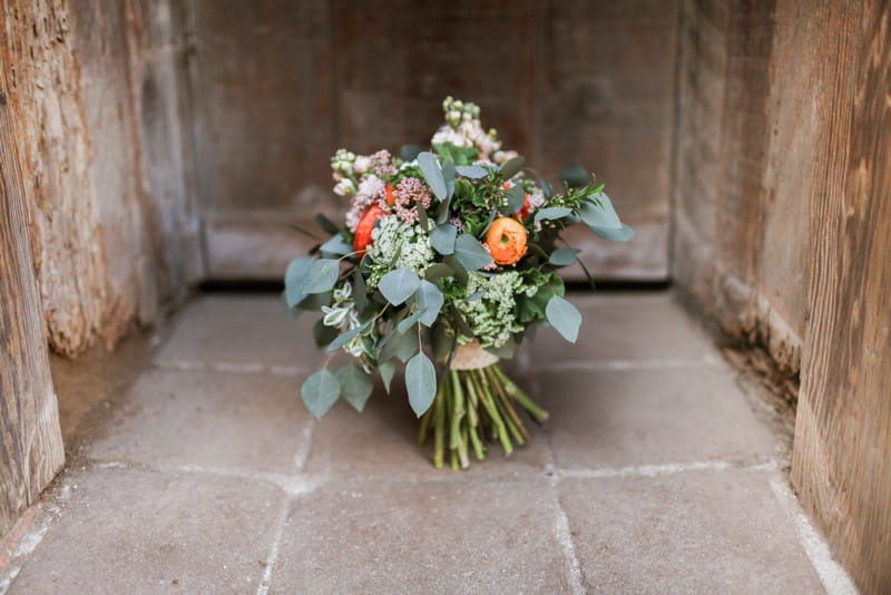 Rustic bouquet in floor in doorway