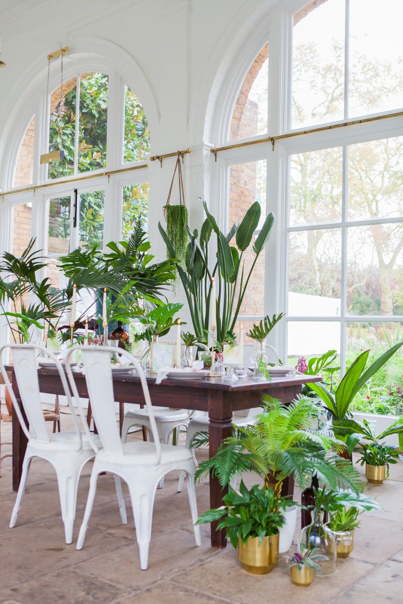 Wedding table with tropical palm styling
