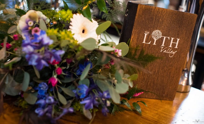 Bridal bouquet next to Lyth Valley Country Inn menu