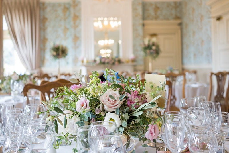 Garden flowers in centre of wedding table at Pendley Manor