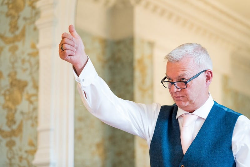 Man giving thumbs up during speech