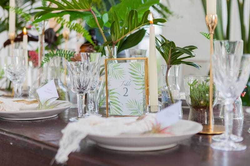 Palm and gold wedding table styling