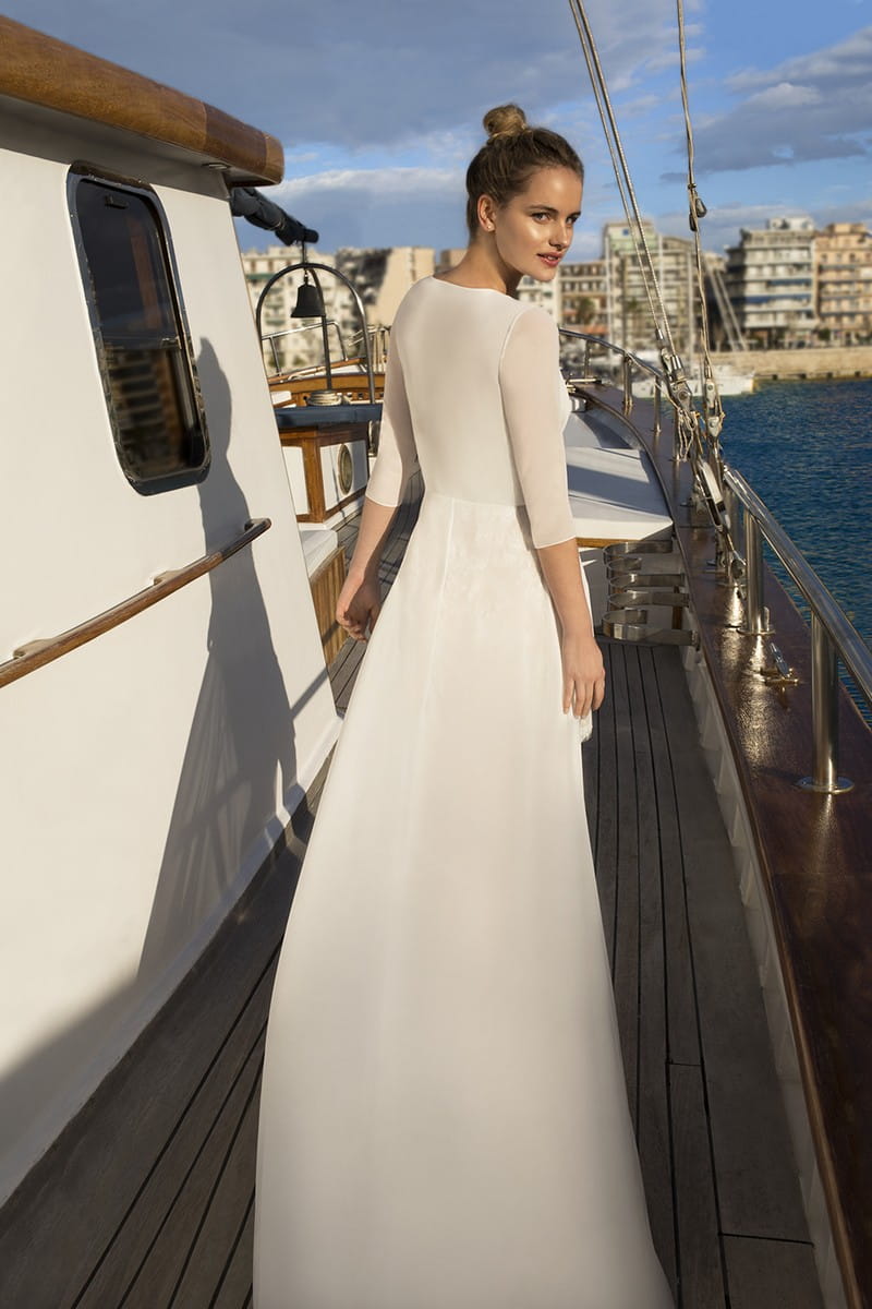 Back of DR256 Wedding Dress with Cape from the Demetrios Destination Romance 2019 Bridal Collection