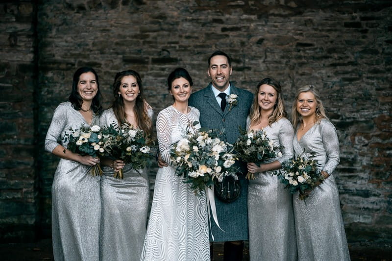 Bride and groom with bridesmaids