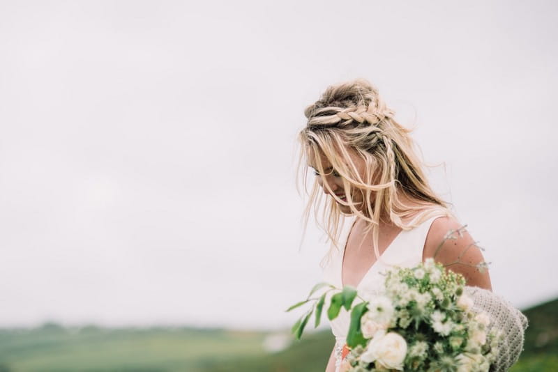 Bride with braid in messy hair