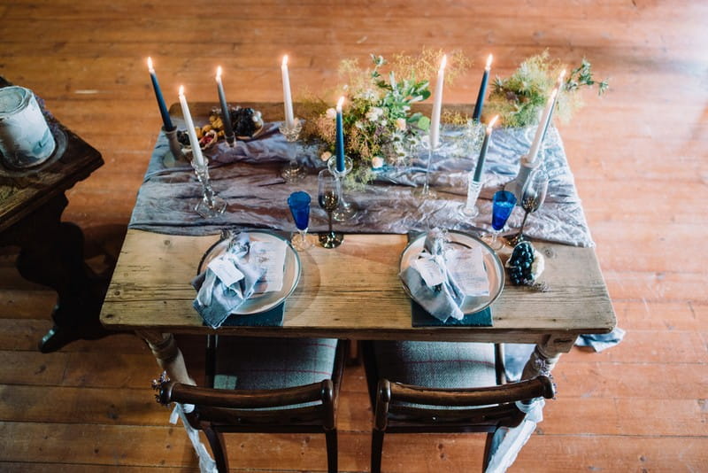 Small wedding table with blue linen and grey styling