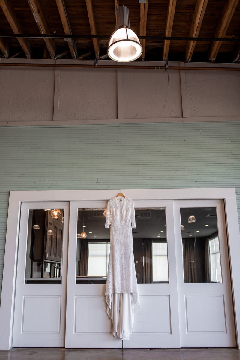 Wedding dress hanging over doors in Events at Haven