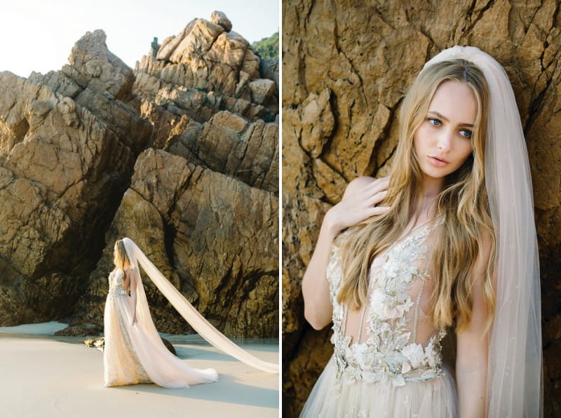 Bride with long veil walking across beach