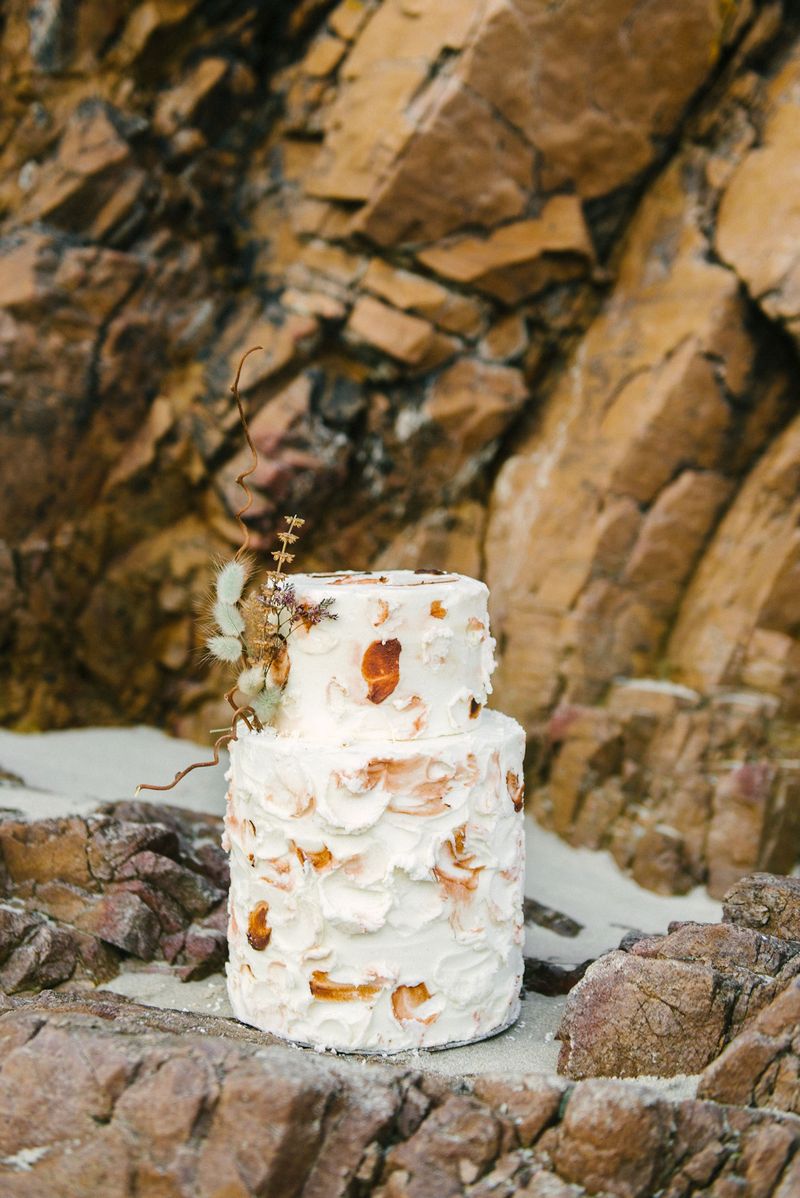 Wedding cake with rust coloured detail