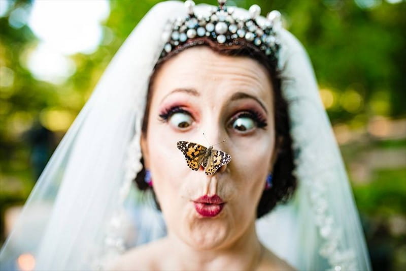 Bride with butterfly on her nose - Picture by Creatrix Photography