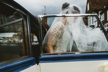 Bride getting out of wedding car - Picture by York Place Studios