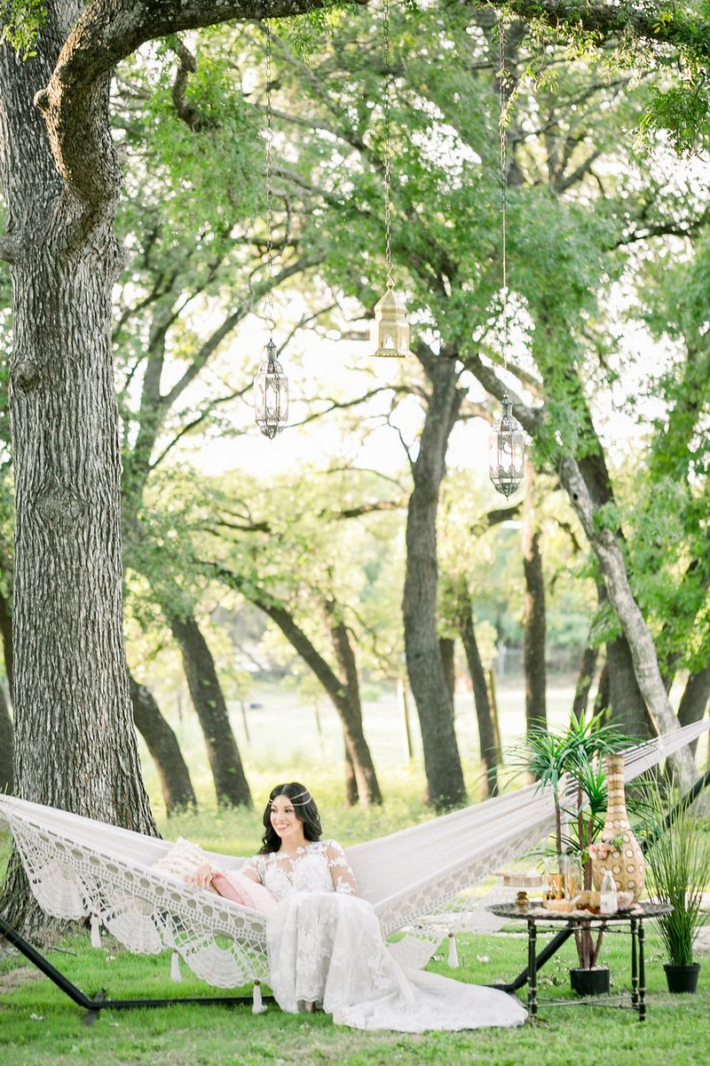 Bride-to-be sitting in hammock