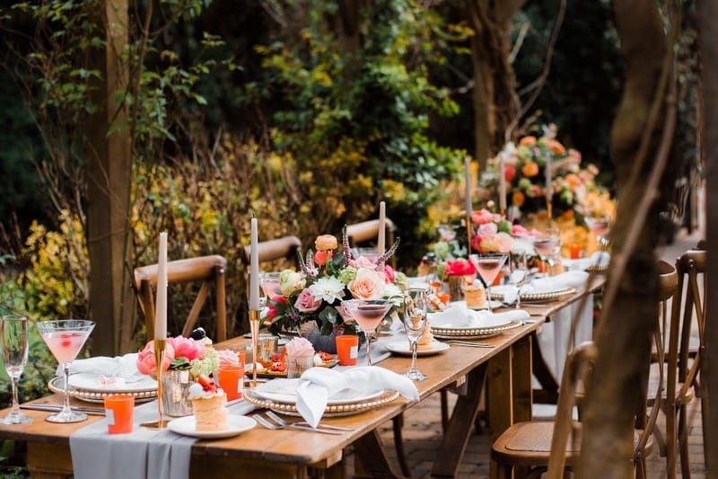 Wedding table with Living Coral and gold styling