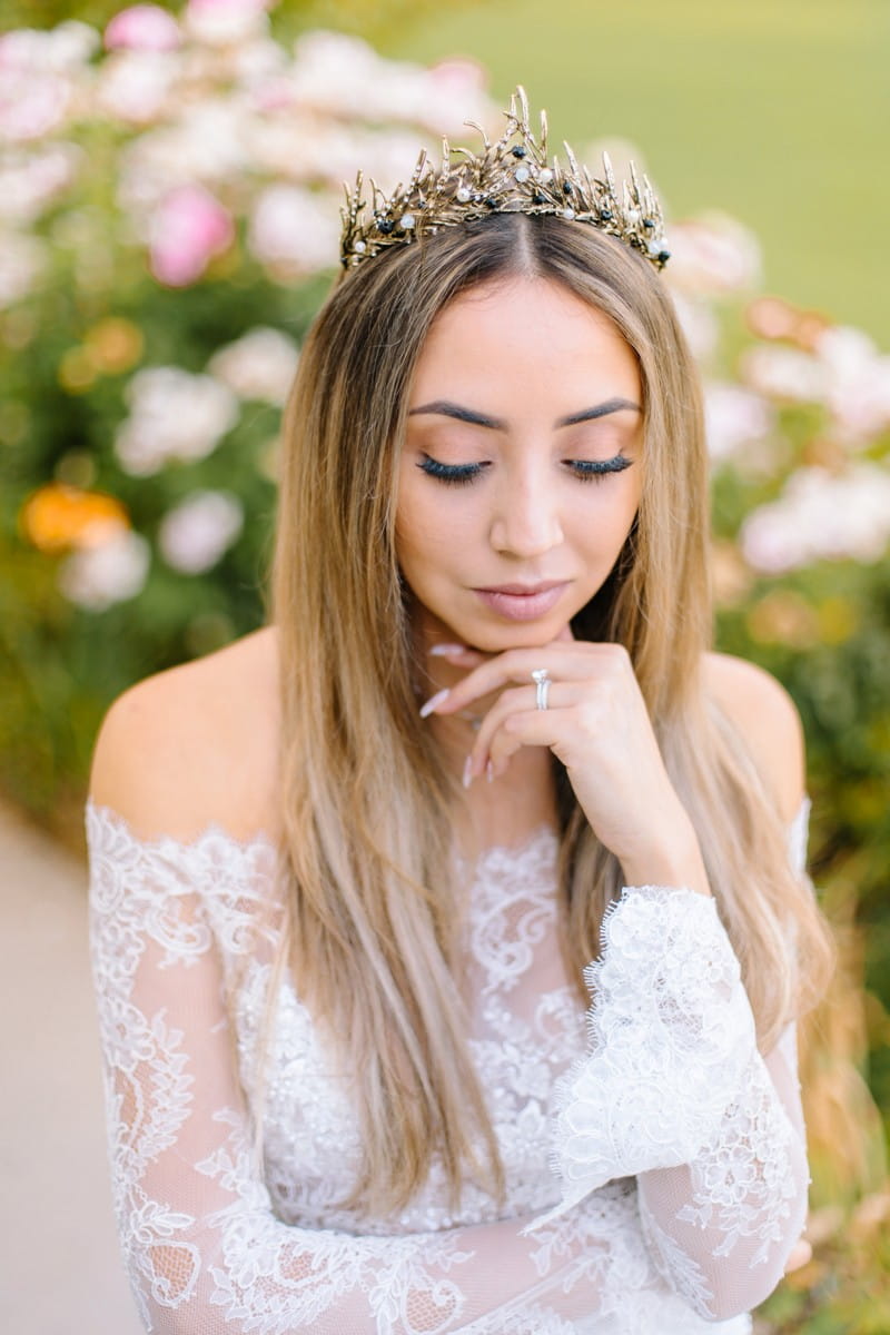 Bride with long parted hairstyle wearing tiara
