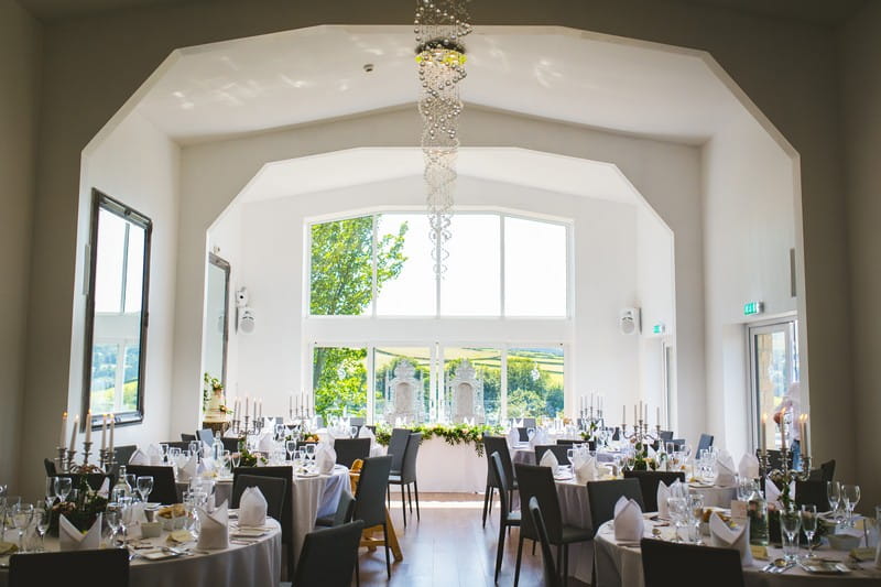 Wedding tables in dining room at Holmfirth Vineyard