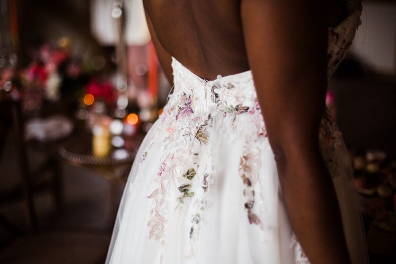 Flower detail on back of bride's dress