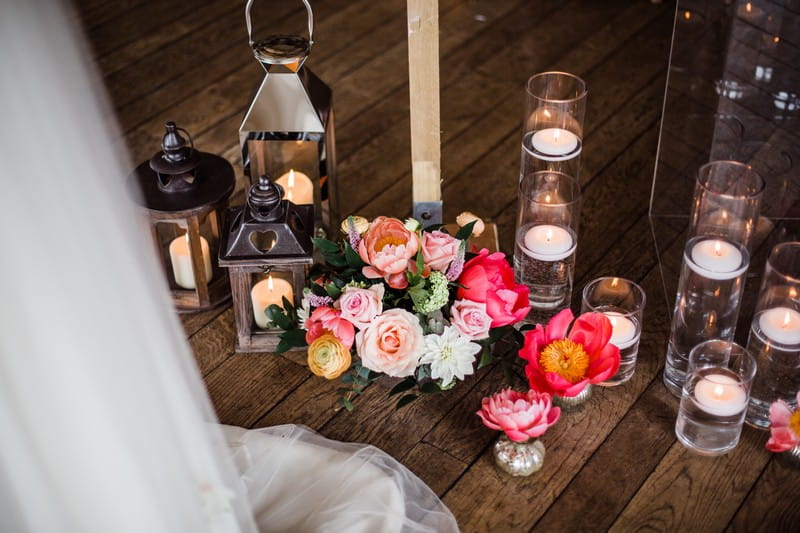 Flowers, candles and lanterns on floor